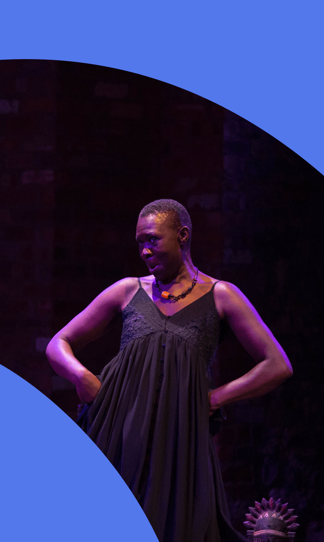 Adult woman on stage performing 