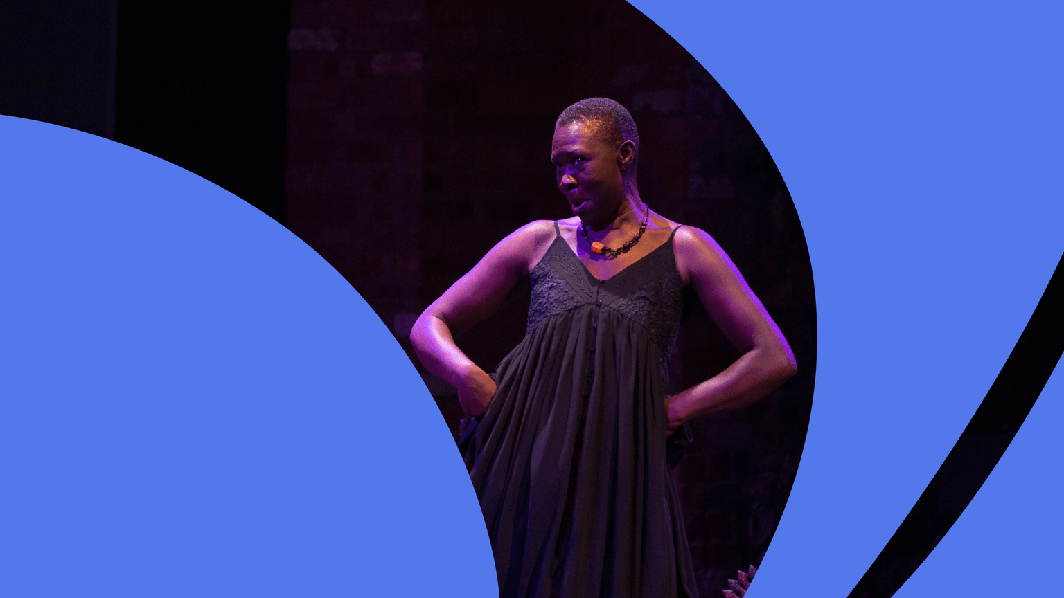 Adult woman on stage performing 