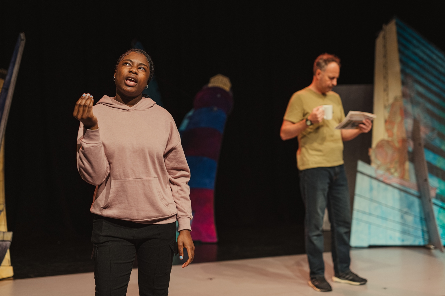 Image of actors performing on stage